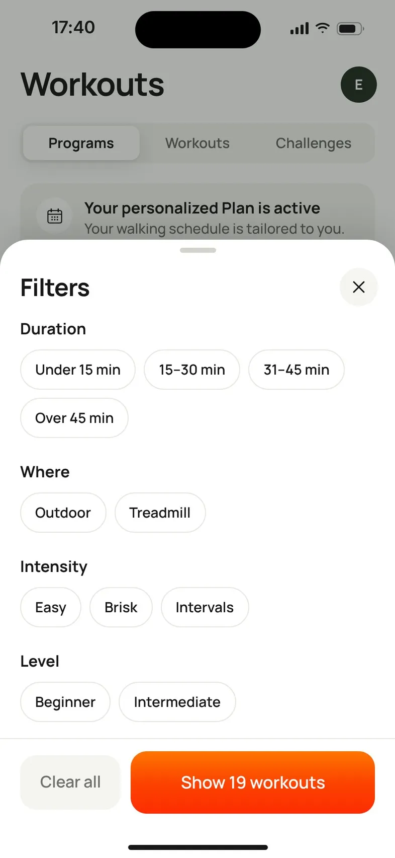 The Filters sheet with Duration, Where, Intensity and Level options, Clear all and Show 19 workouts.