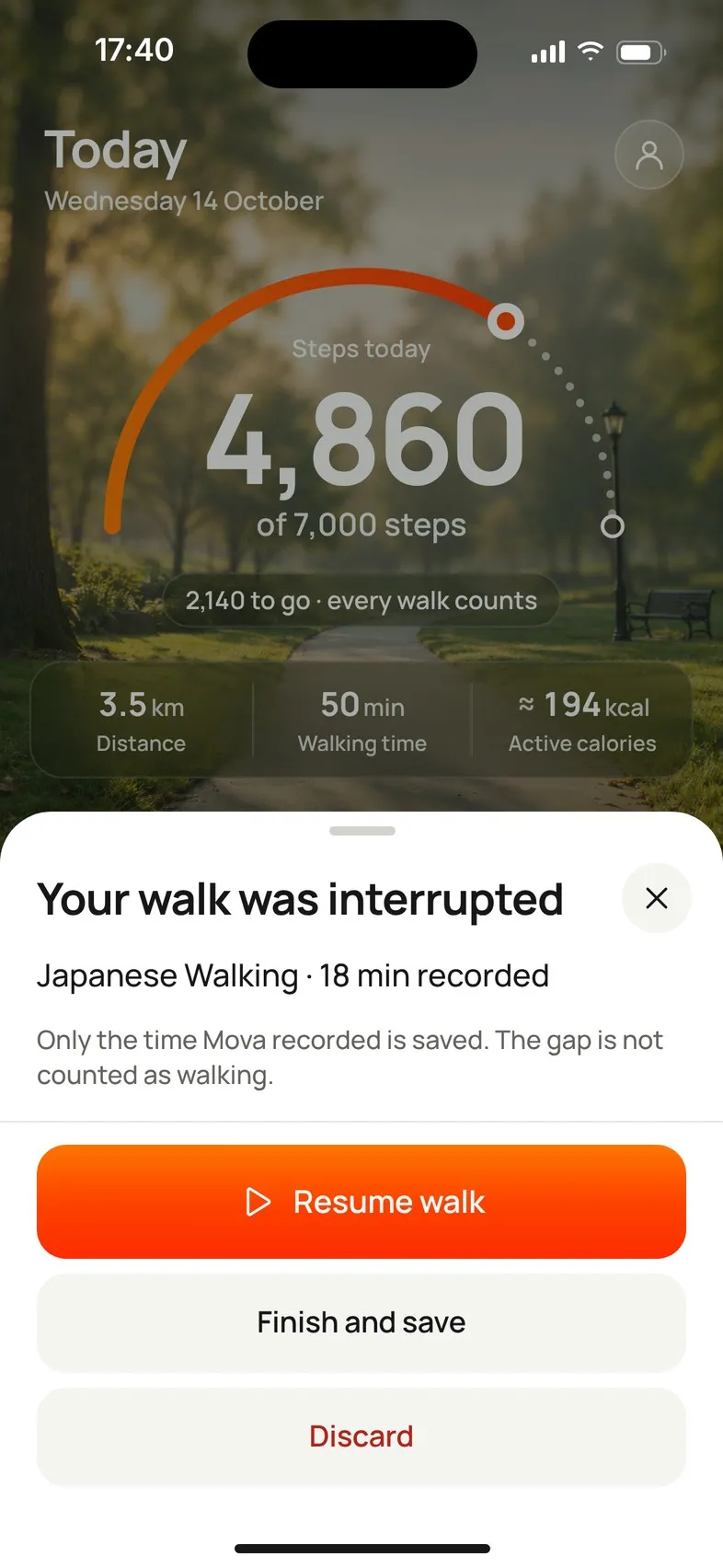The Your walk was interrupted sheet: Japanese Walking · 18 min recorded, with Resume walk, Finish and save and Discard.